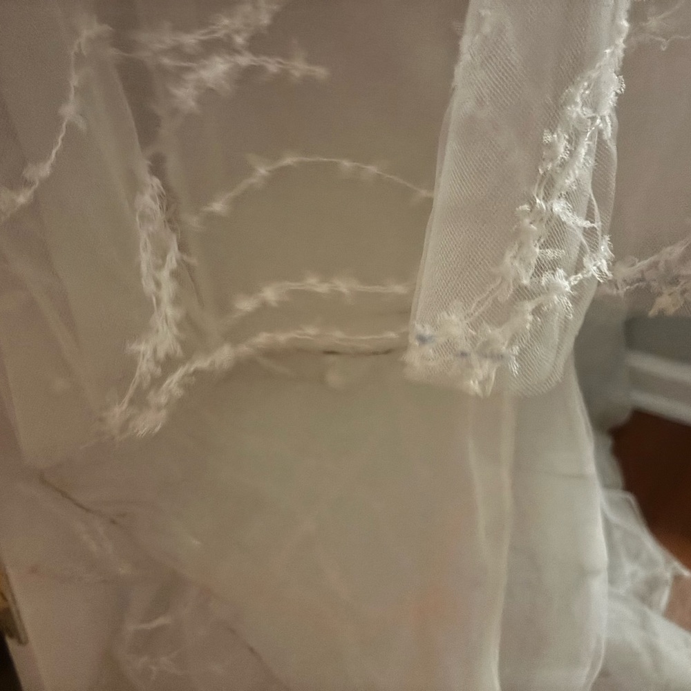 Mira Zwillinger Marvel
Elegant White Strapless Wedding Dress - Picture 10 of 16